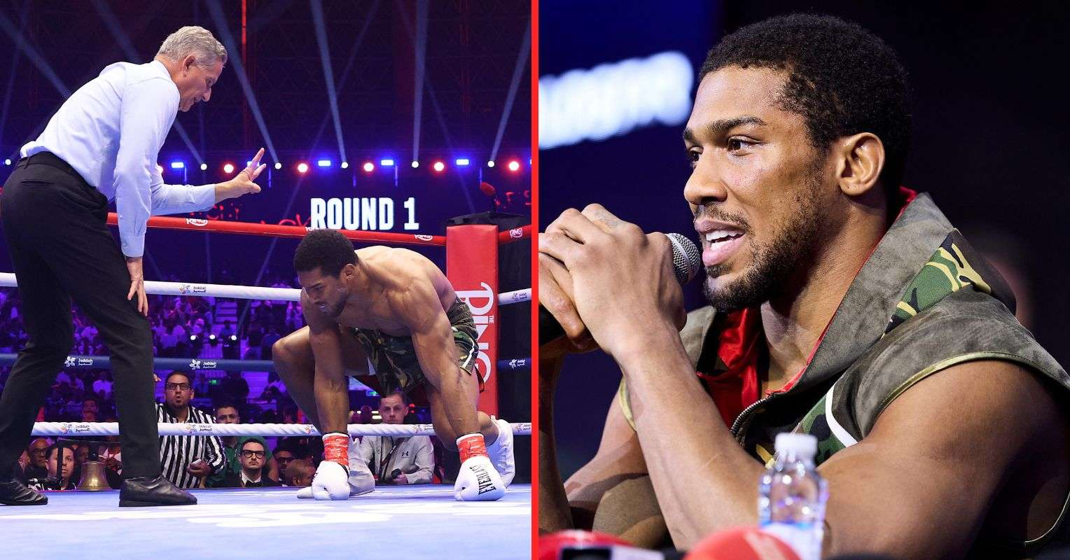 Anthony Joshua down and with mic
